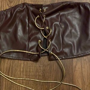 This is a tie up tube top that still has the tag on it